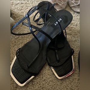 Jet black high hill shoe